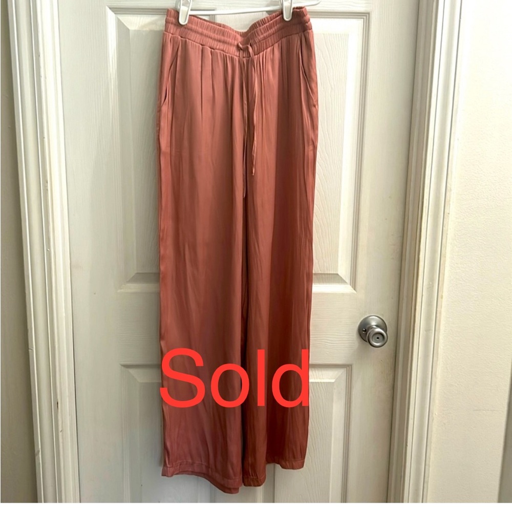 Stradivarius pink satin pants.